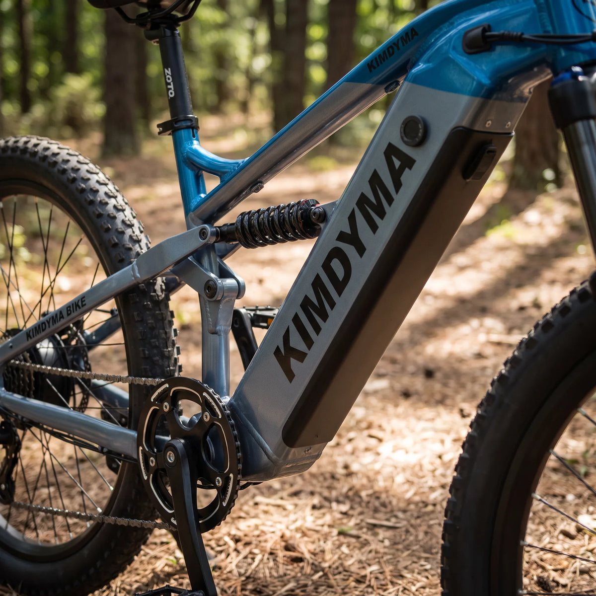 Close-up of the Samsung 960Wh battery integrated into the downtube of a Kimdyma K01 electric mountain bike, showing the